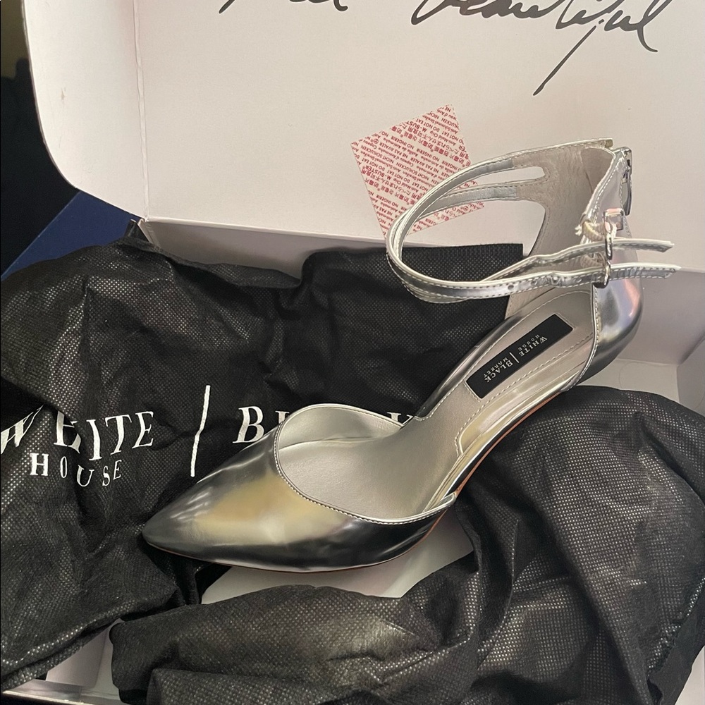 White House Black Market size 8M silver shoes . Used once for wedding .